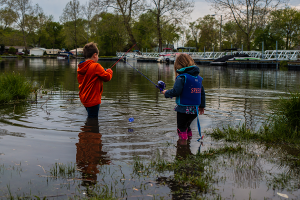 kids in the water fishing