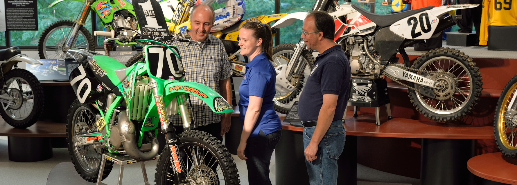 couple looking at motorcycle