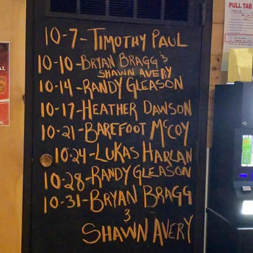 A chalkboard with New Dam Pub's October lineup.