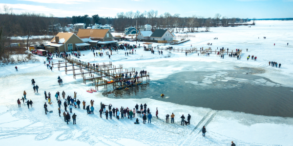 Photo of a large group of people walking on the frozen Buckeye Lake