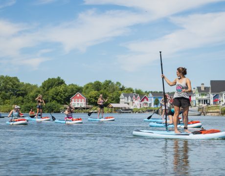 Photo of a woman on Buckeye Lake teaching a water boarding class.