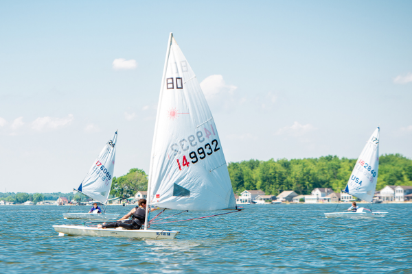 Photo of single person sailboats riding on Buckeye Lake.