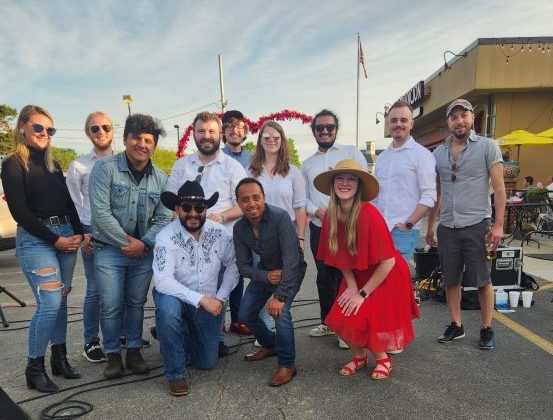 Photo of a group of people posed in front of Buckeye Lake Margaritas.