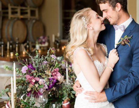 A newly wedded couple pose for a photo at the Buckeye Lake Winery.