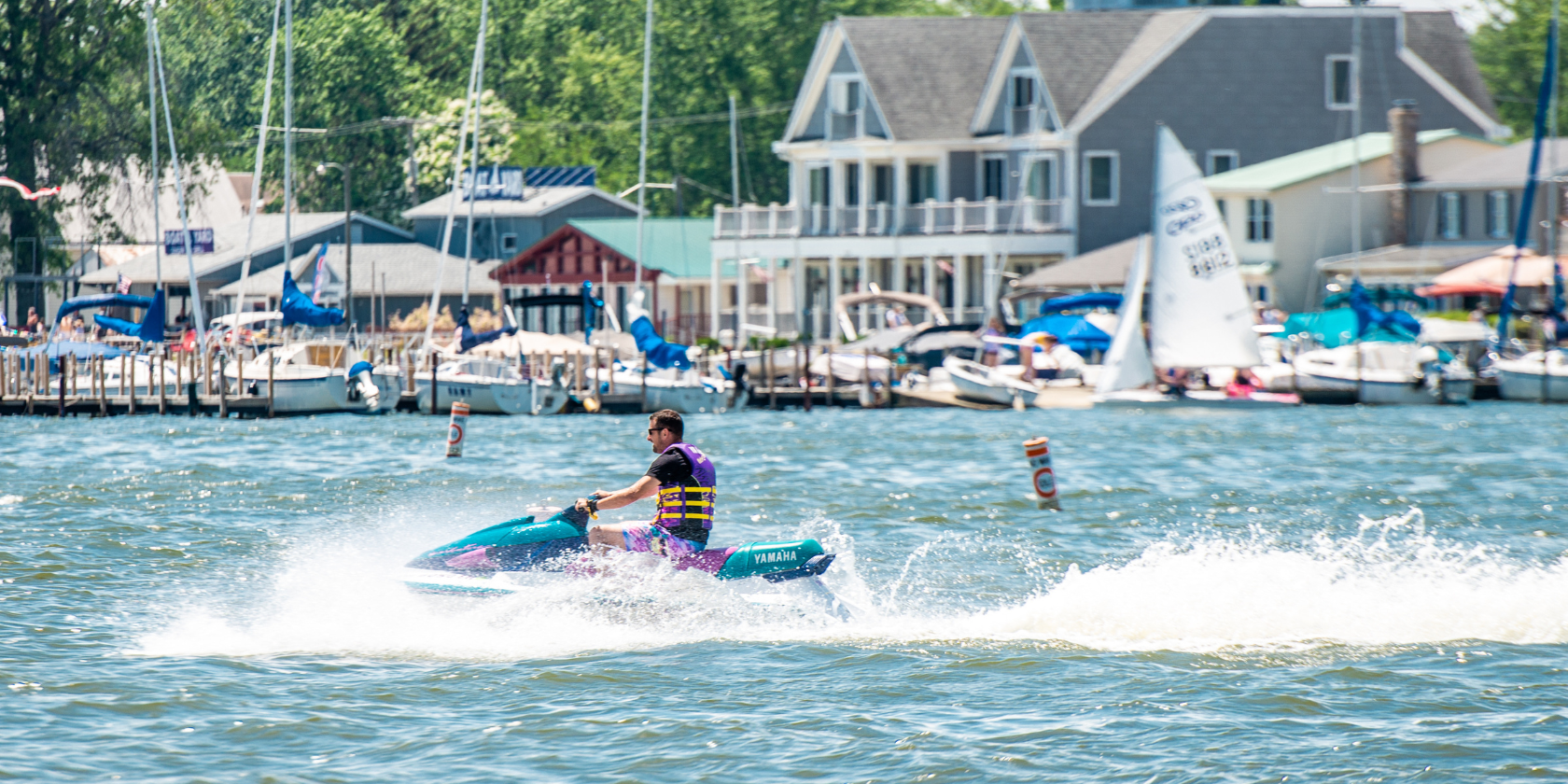 A man jet skis across the water of Buckeye Lake.