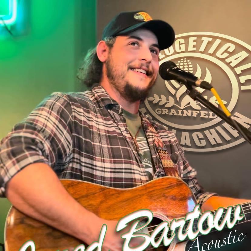 Photo of musician Jared Bartow singing.