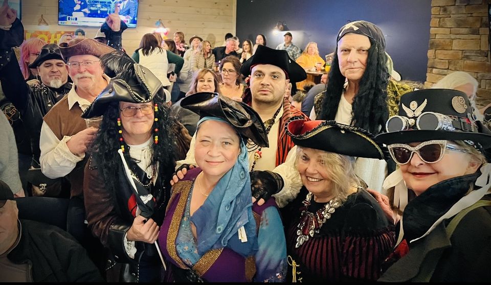 Photo of a group of people dressed up as pirates.