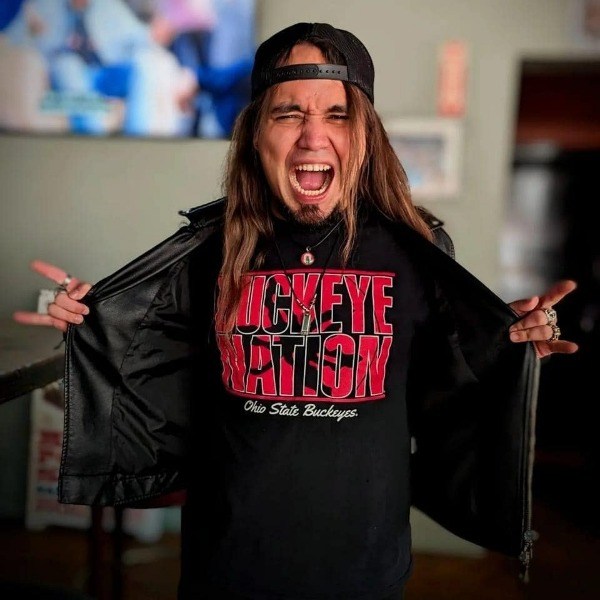 Picture of musician Davey McCandlish, with a shirt on that says "Buckeye Nation".