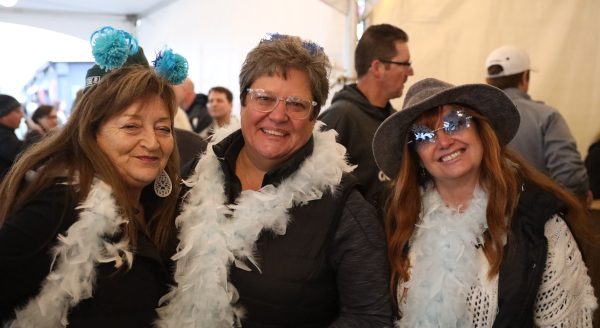 three woman posing for a photo