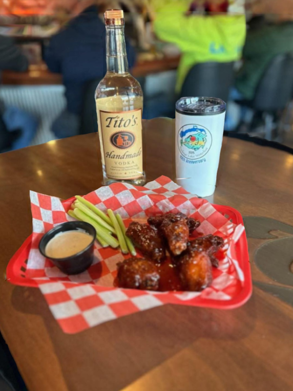 wings and tito's on a table